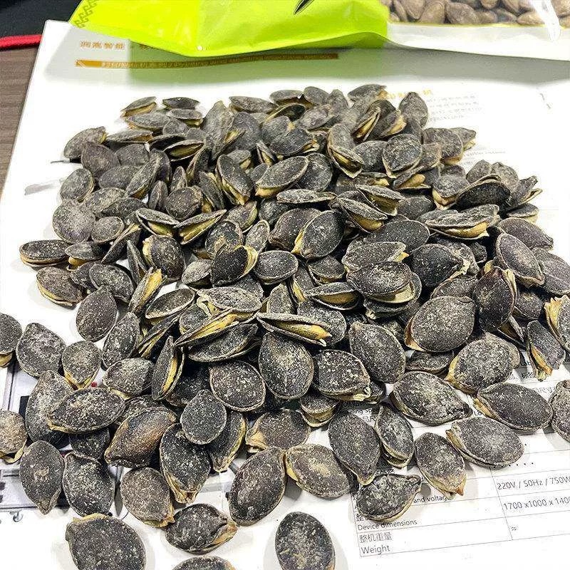 新货黑金刚南瓜子熟南瓜籽开口椒盐焗古法咸味南瓜子炒货休闲零食