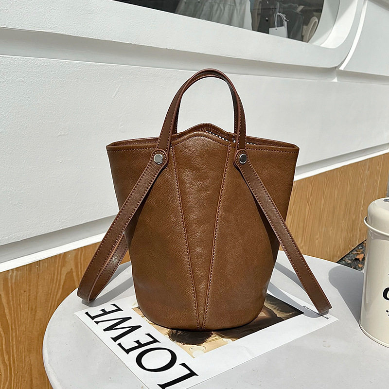 头层植鞣牛皮水桶包包女新款复古小众单肩斜挎包水桶型手提包,箱包皮具/热销女包/男包,水桶包,淘宝优惠券,粉丝福利购,淘宝优惠卷