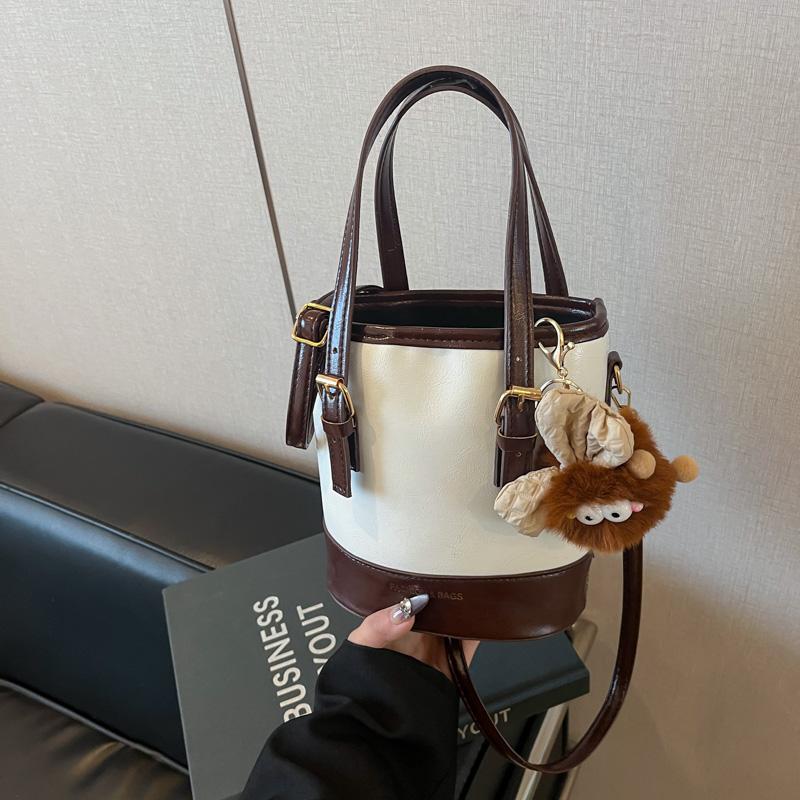 单肩斜挎包休闲手提水桶包