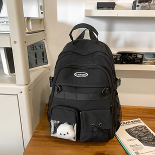 大容量上学痛包书包初中生男生小学生六年级背包新款多口袋双肩包