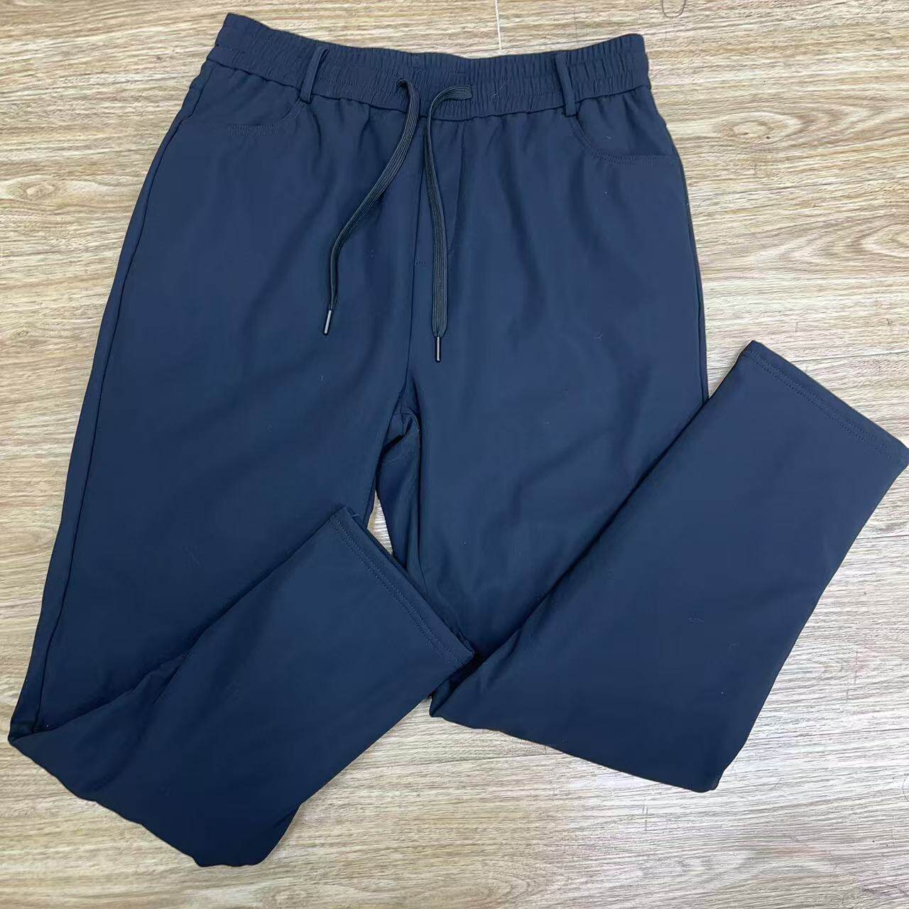 大码特价男士纯色松紧腰抽绳柔软微弹羽绒保暖御寒休闲抗寒鹅绒裤