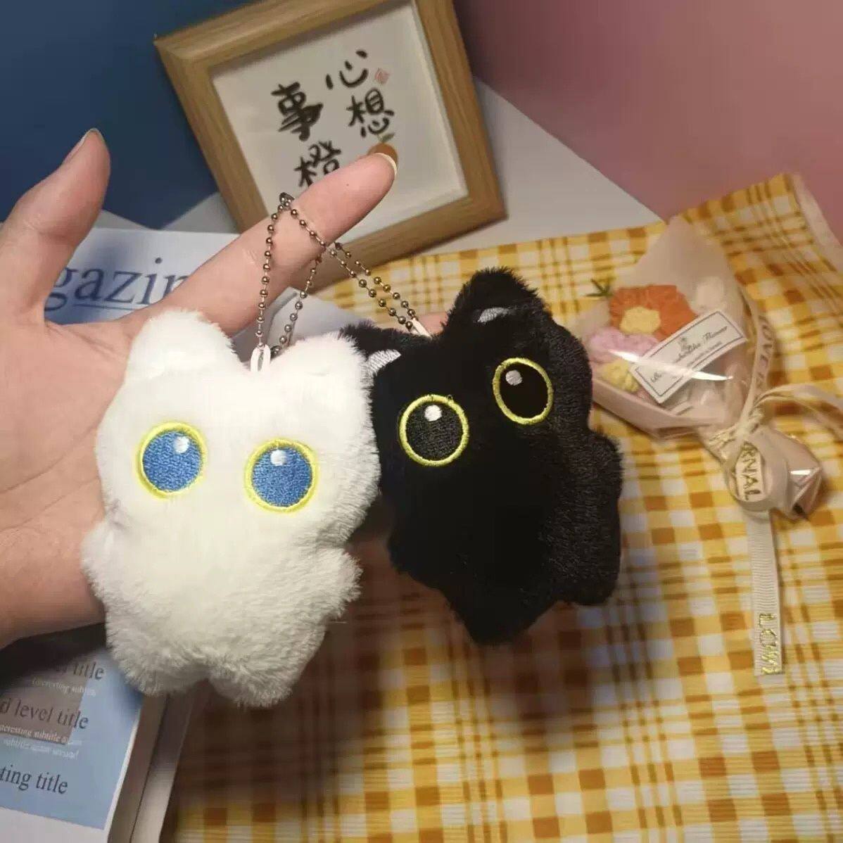 爆款大眼黑猫毛绒玩偶公仔挂件可爱吱吱叫黑色小猫包包钥匙扣挂饰图片