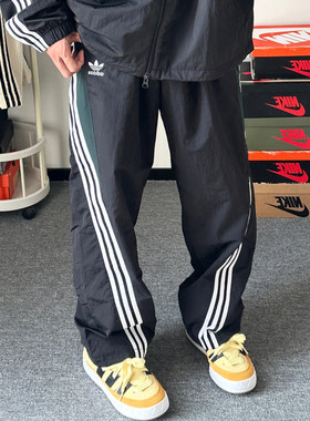 阿迪达斯三叶草男子阔腿裤梭织透气运动休闲扭扭裤长裤 KC3132