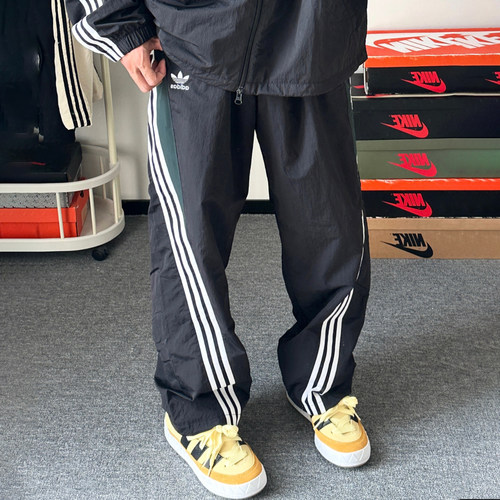 阿迪达斯三叶草男子阔腿裤梭织透气运动休闲扭扭裤长裤 KC3132