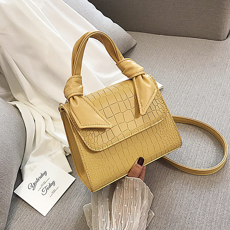 夏季新款石头纹蝴蝶结手提包定型简约女士包包