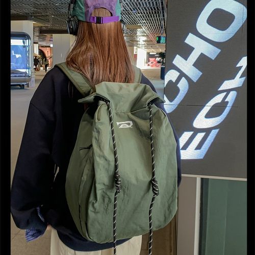 新款抽绳女士男士休闲双肩包小众斜挎包女包百搭设计感高级感背包