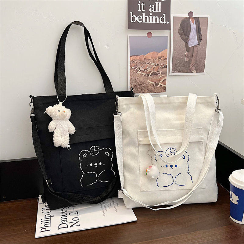 手提袋学生拎书袋初中生帆布包包女新款单肩包大容量学生上课双肩