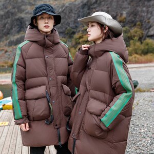 1404-2-D822—P308 高品质印花 90绒羽绒服潮流时尚简约休闲百搭1图片