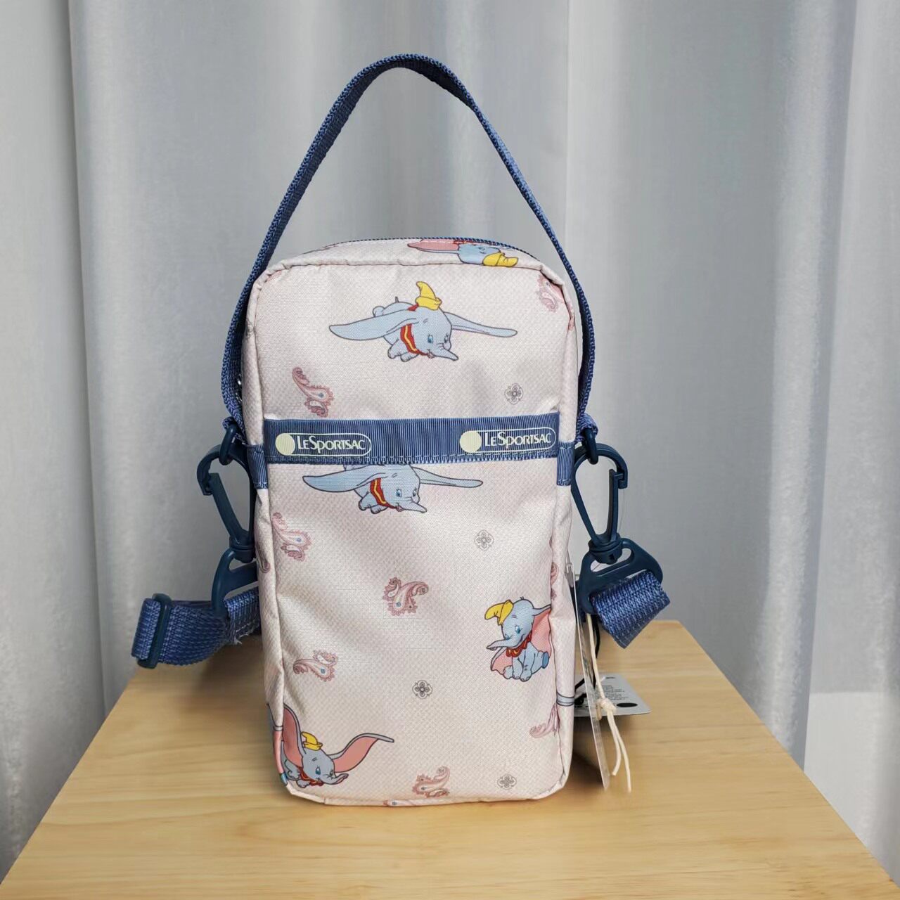 力士保新款 卡通小飞象竖款斜挎包 可爱手提包竖款手机包3505