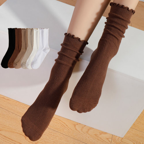 橙乙木耳边棉堆堆袜女中筒黑色