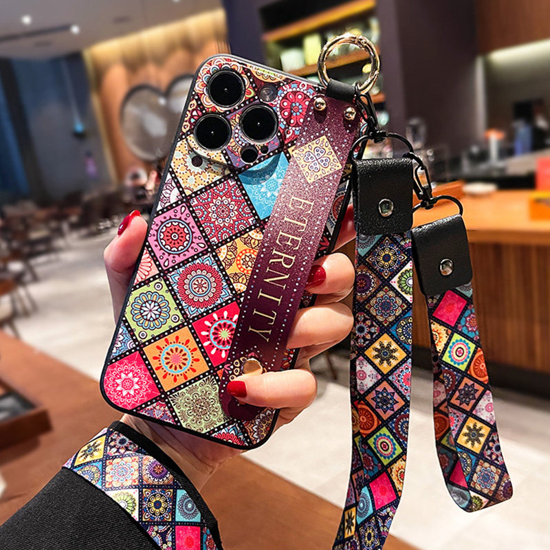 适用苹果15手机壳时尚奢华14promax新款iphone13腕带12pro带挂绳挂脖11硅胶xs防摔XR支架7/8plus高级感6p女潮属于什么档次？