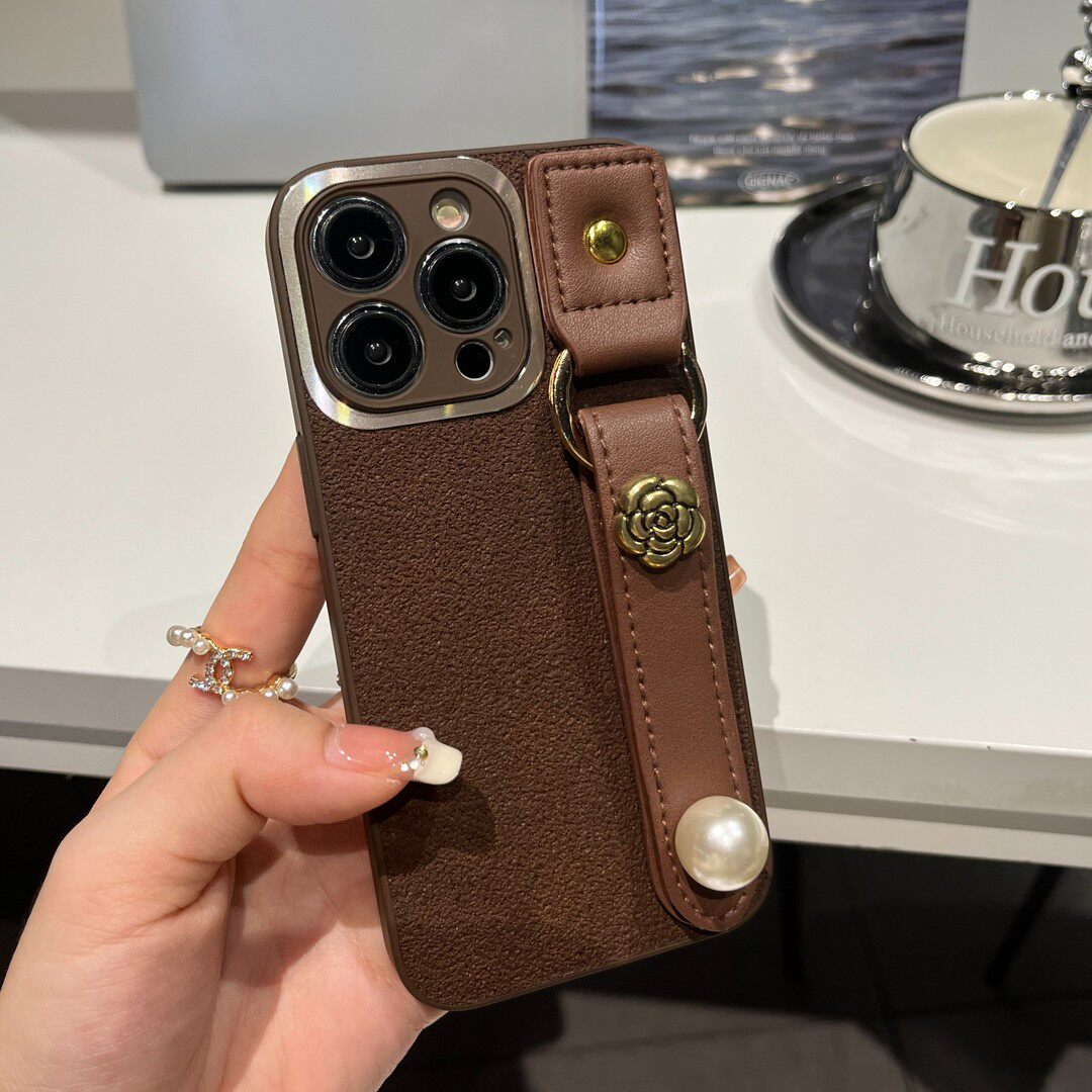 秋冬款月坑纹适用iPhone17promax手机壳新款16/15山茶花14pro保护套华为mate70/p80美拉德小米17腕带x200软壳