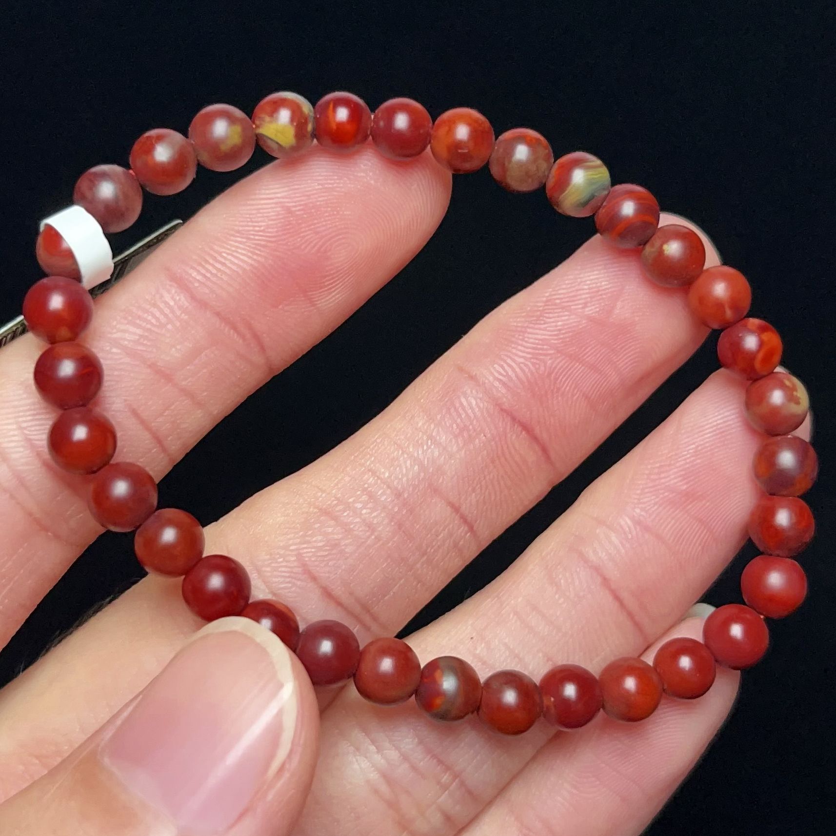 606C09凉山九口料南红鸡血包浆单圈手串