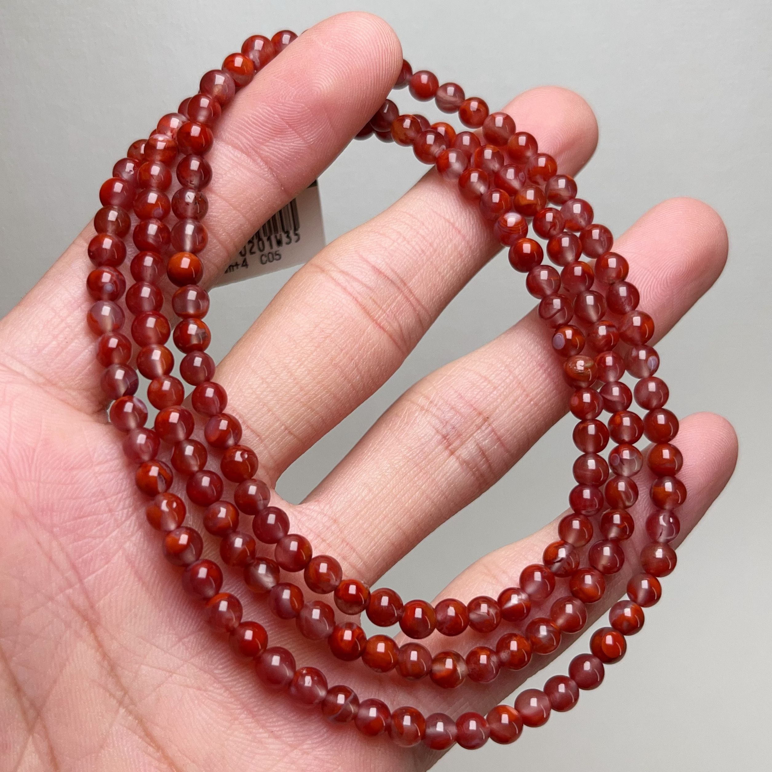 035C05凉山南红玫锦红飘花小米多圈手串项链