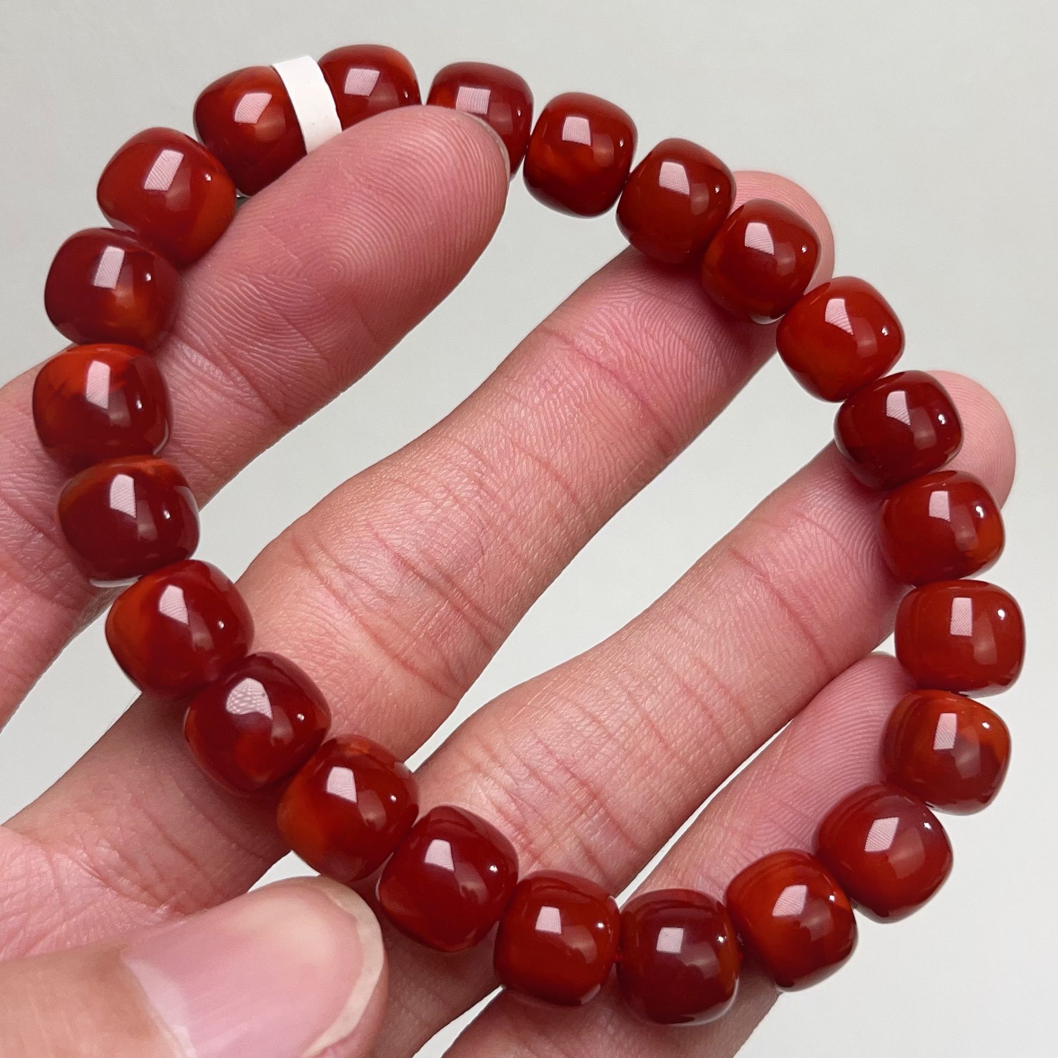 1408C31凉山瓦西料南红双色牛血单圈手串