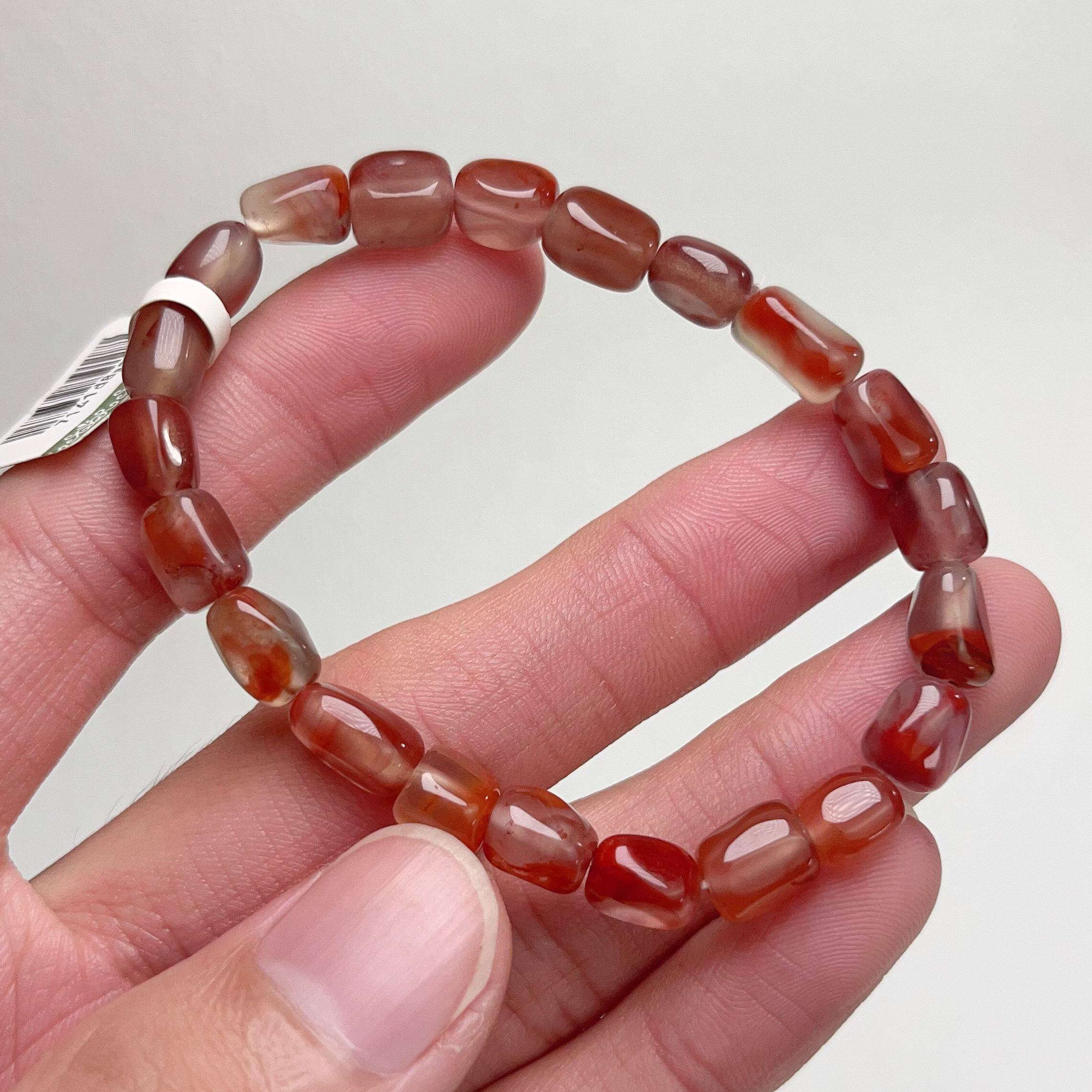 030C17凉山瓦西料南红玉化柿子红随型单圈手串