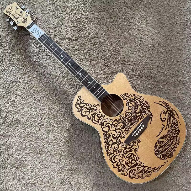 美国品牌 LUNA 露娜凤凰雕刻云杉桃花芯合板民谣木吉他缺角40寸