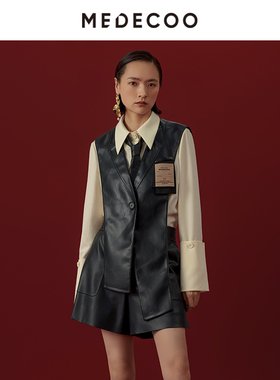 MEDECOO/墨蒂珂冬季新款 一粒扣不规则摆PU马甲披肩MHDS1202