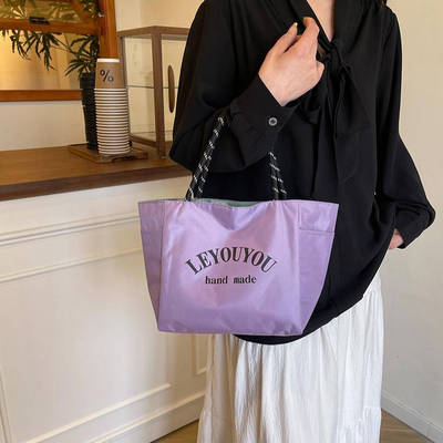 多巴胺纯色防水布手提袋饭盒包上班通勤便携手提包外出百搭妈咪包