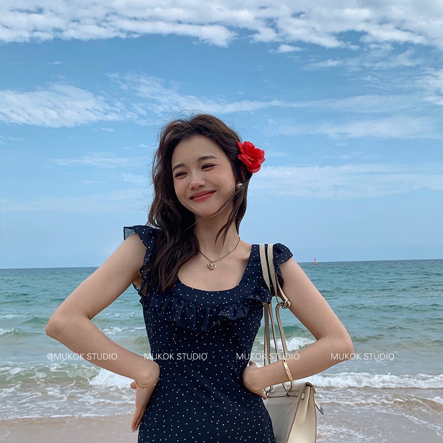 2026夏季新款藏青色波点荷叶边短袖连衣裙女性感露背中长款裙子