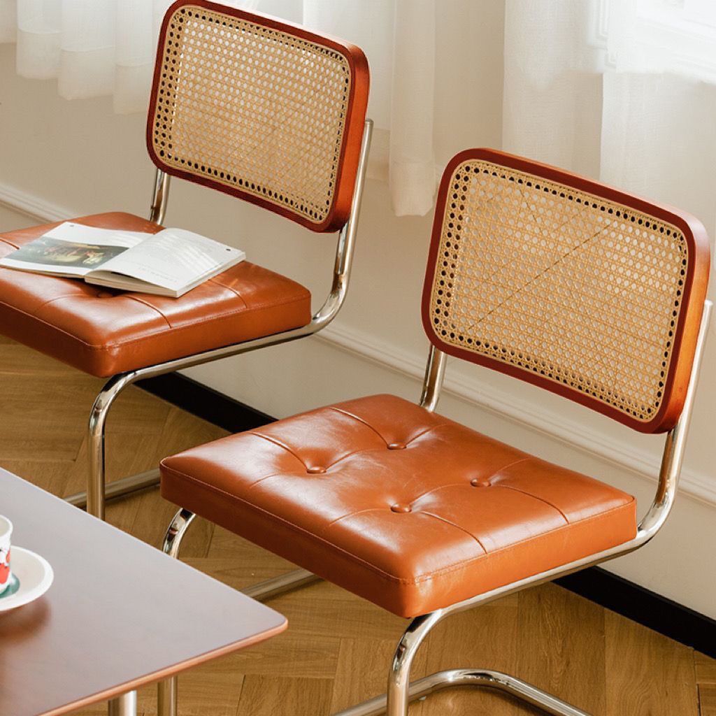 弓形藤编软包椅子北欧家用设计师餐椅网红咖啡厅酒店休闲椅中古椅