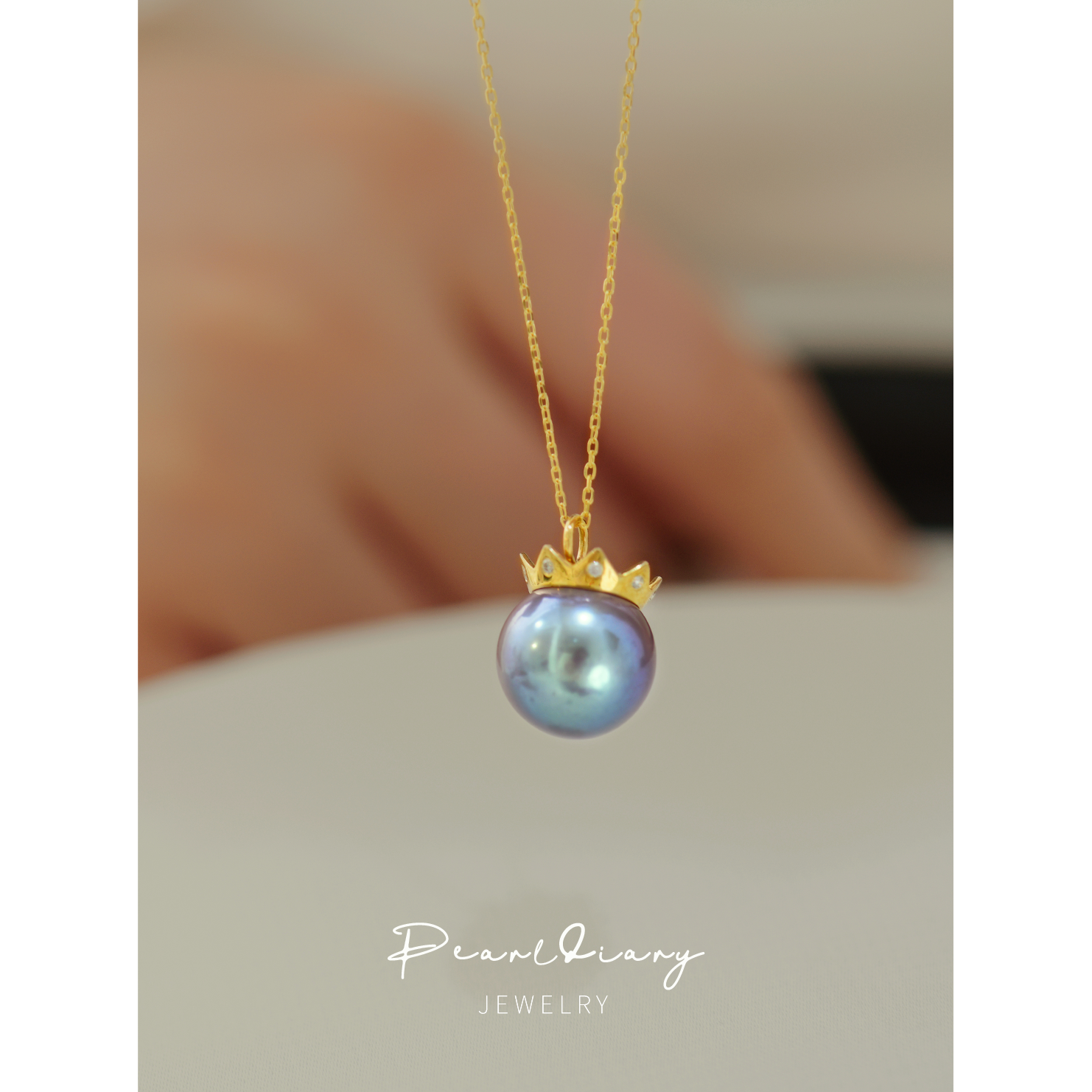 18K金紫珍珠圆形皇冠钻石