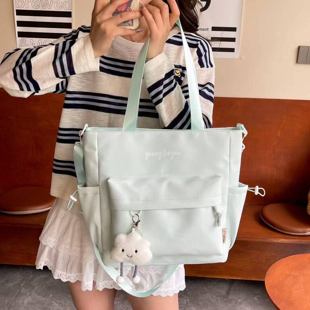 帆布包女款2026新款大容量韩系ins通勤斜挎包学生装书补习手提袋