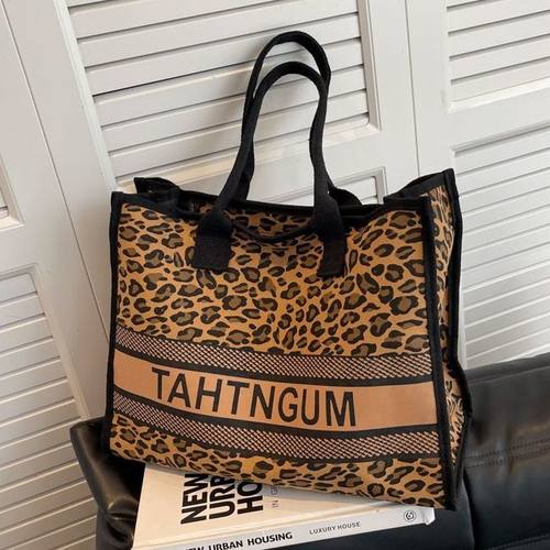 手提帆布包女款2025新款韩系慵懒风大容量通勤外出妈咪豹纹单肩包