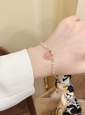 夏季水蜜桃抽拉珍珠手链女