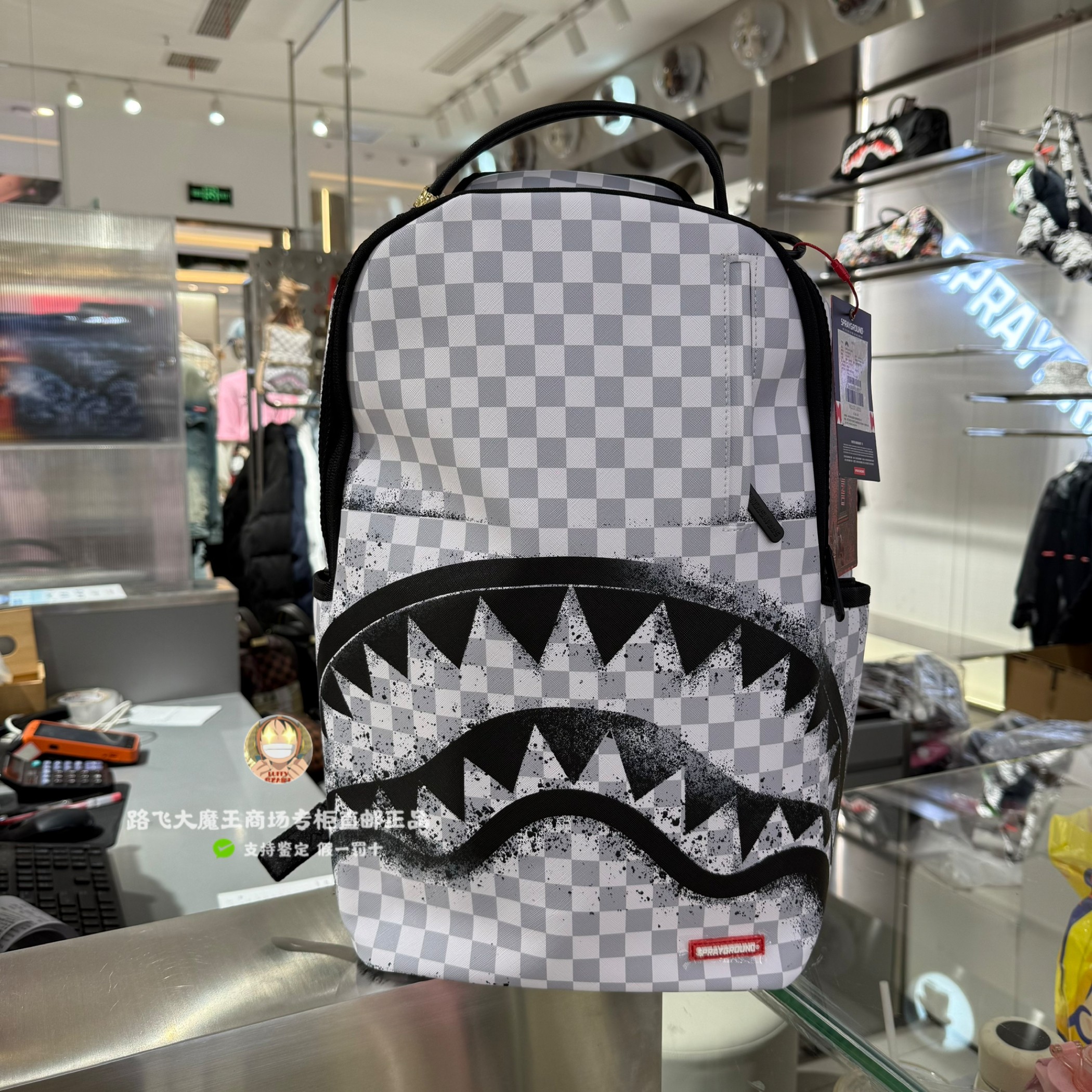 SprayGround鲨鱼嘴专柜正品 W1215711涂鸦棋盘格大容量男女双肩包