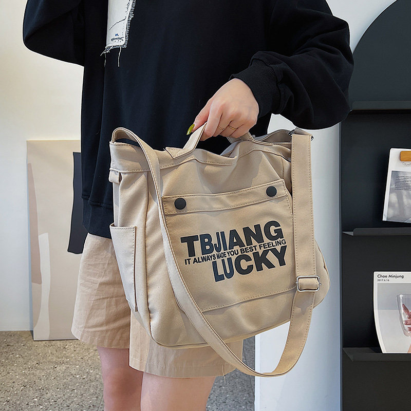 大学生帆布包女单k肩包2022新款布袋包通勤单肩R包手提大容量斜挎,箱包皮具/热销女包/男包,时尚帆布包,淘宝优惠券,粉丝福利购,淘宝优惠卷