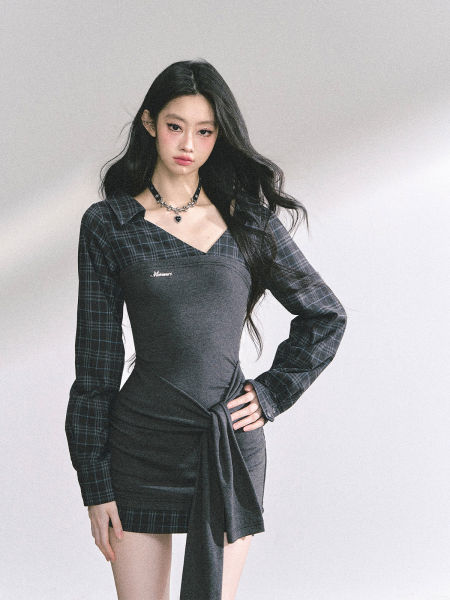 Model wearing a dark plaid long-sleeve mini dress