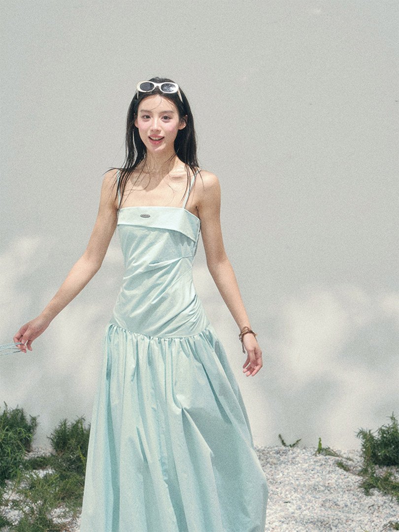 Light blue spaghetti-strap dress worn by a model