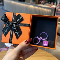 Электронная сиреневая оранжевая подарочная коробка