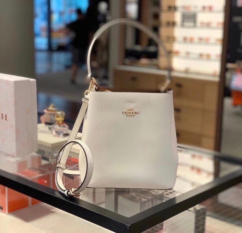 国内现货COACH蔻驰白色纯皮单肩斜挎包水桶包百搭流浪包女士包袋,箱包皮具/热销女包/男包,水桶包,淘宝优惠券,粉丝福利购,淘宝优惠卷