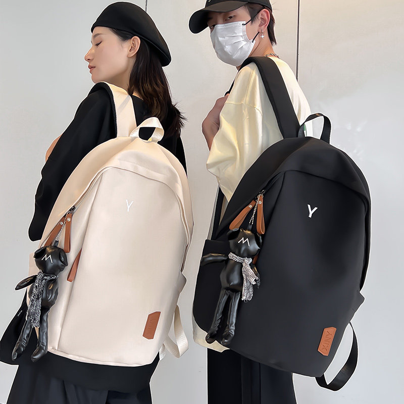 新款双肩包男士大容量初中高中大学生书包日系休闲运动旅行背包女