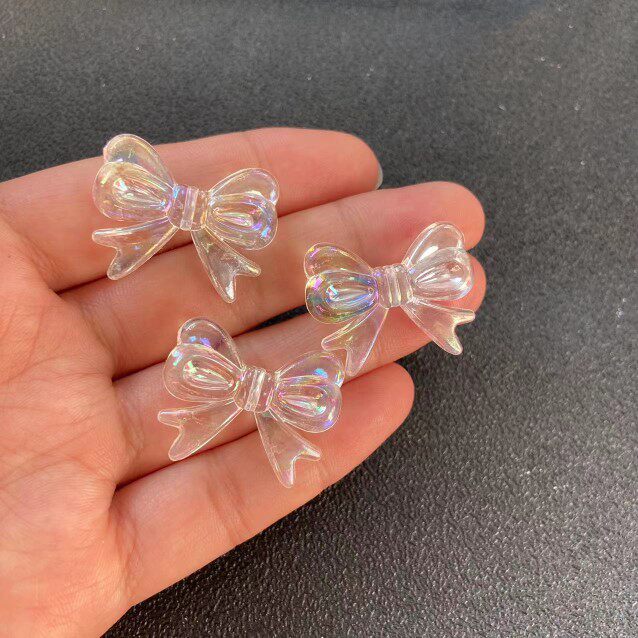 七月手作diy滴胶奶油胶手机壳材料镭射炫彩蝴蝶结饰品树脂配件