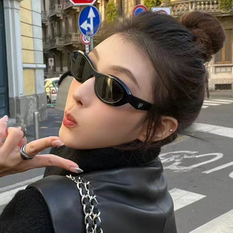 女猫眼三角标防晒窄框椭圆形墨镜
