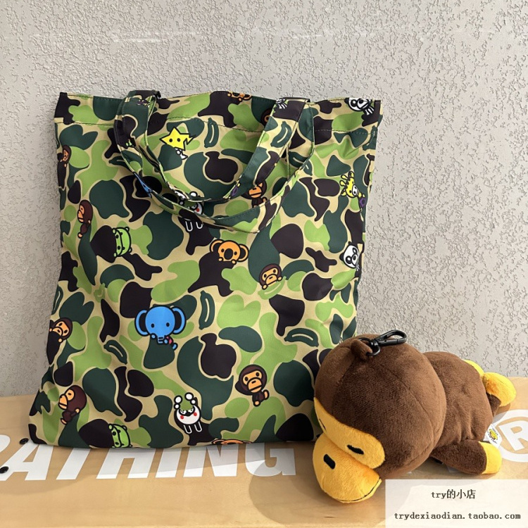 现货 BAPE BABY MILO 绿迷彩小猴子图案 可收纳环保袋 手提单肩包
