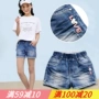 Quần short denim bé gái 2019 hè mới mặc 12 quần trẻ em khí chất hoang dã Quần bé lớn quần hot 15 tuổi - Quần jean quần jean trẻ em