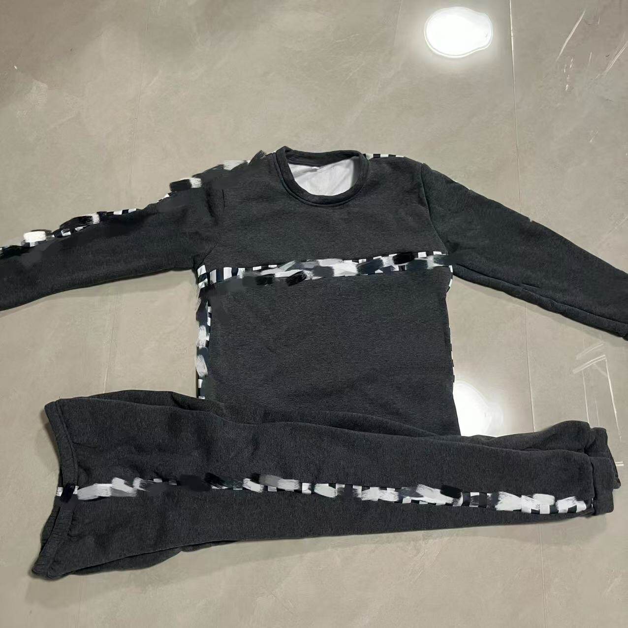看手锁居留锁鉴于舞台表演服加绒加厚保暖囚衣男女同款宽松圆领