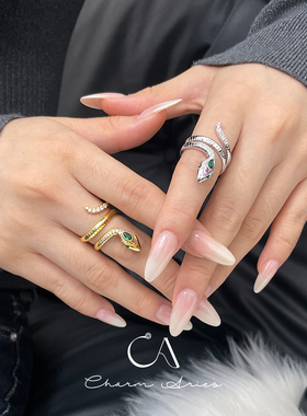 情侣S925纯银小众绿眼灵蛇戒指