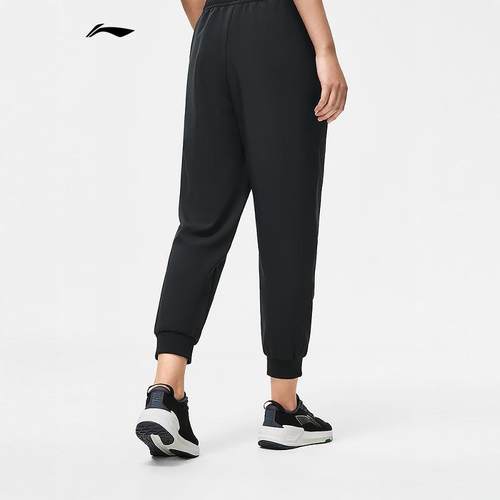 李宁女子健身系列时尚潮流休闲百搭宽松防泼水运动长裤AYKT652