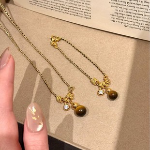 SSJEWELRY轻奢珠宝s925银镀金黑金编织秋冬虎眼葫芦跑环项链手链