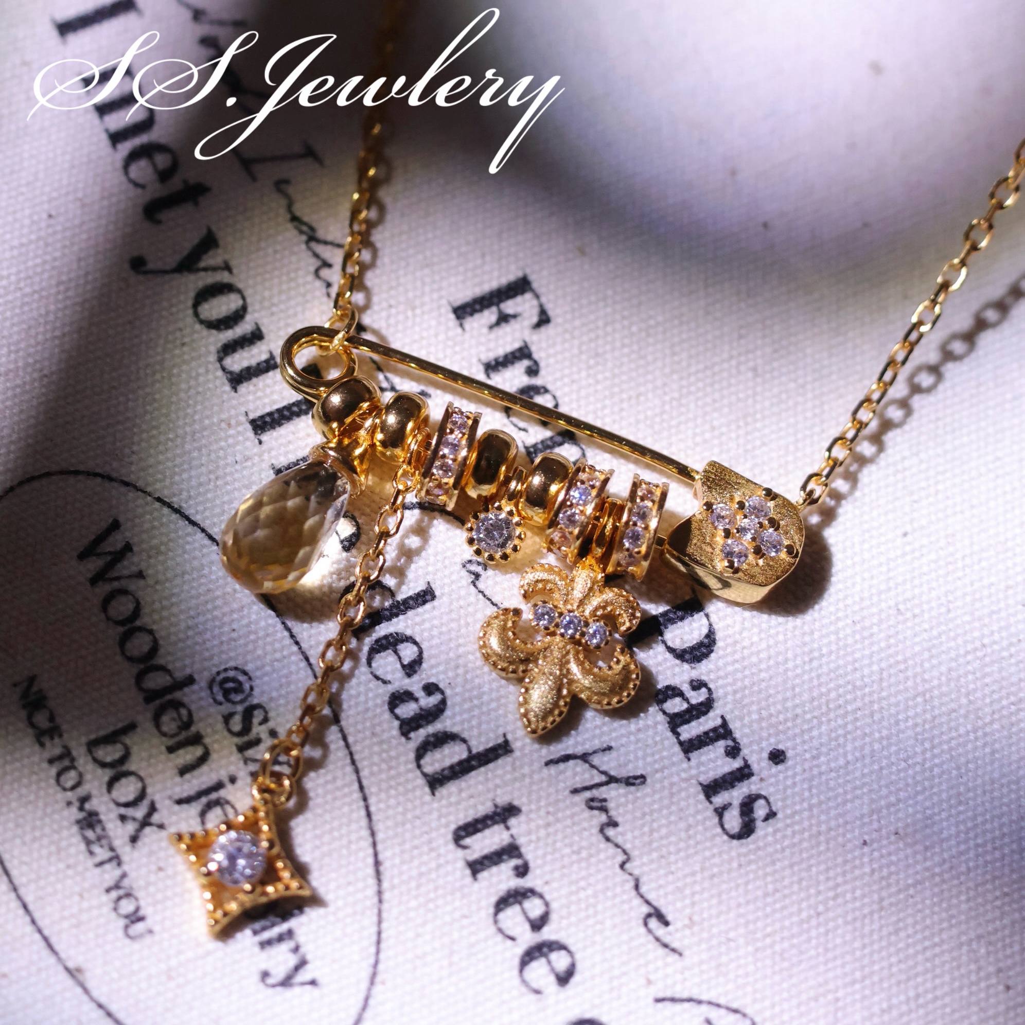 现货 SSJEWELRY轻奢珠宝拉丝黄水晶鸢尾花别针项链DIY时尚锁骨链