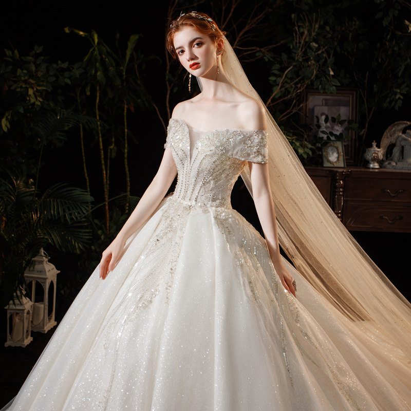 新娘主婚纱礼服2020新款气质森系大拖尾星空显瘦遮粗手臂一字肩轻