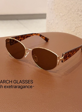 复古港风金属椭圆猫眼墨镜女2025新款高级感防紫外线窄框太阳眼镜