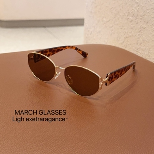 高级感防紫外线窄框太阳眼镜 复古港风金属椭圆猫眼墨镜女2025新款