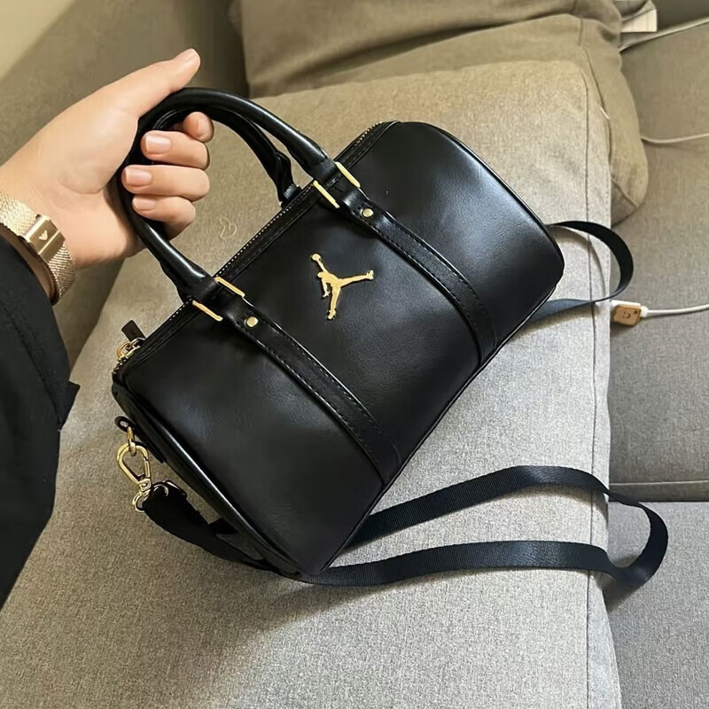 Jordan单肩包女包斜挎包小包桶包皮革飞人休闲AJ女士皮革金标包