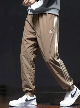 adidas三叶草梭织运动裤男裤子夏季新款透气三条纹篮球薄款束脚裤